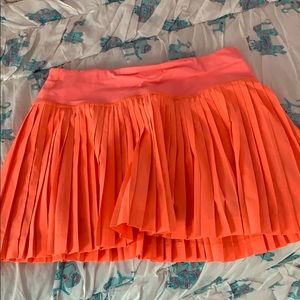 Neon pink/orange lululemon pleated skirt